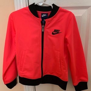pink and black nike jacket